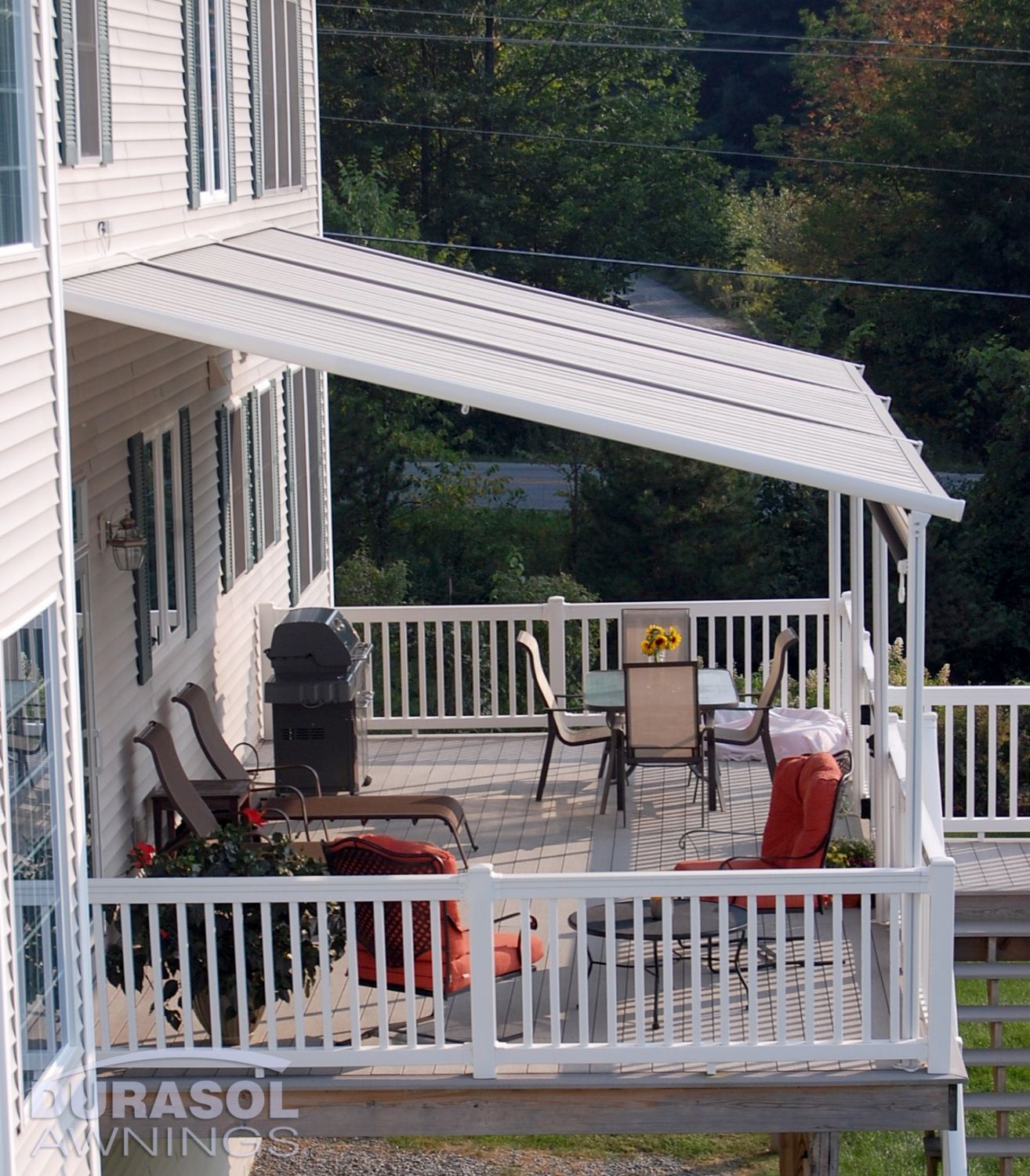 Pinnacle One awning with structure on deck patio