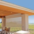 Oasis 2800 patio shade driven by Lutron