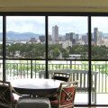 Insolroll solar shade with Denver Skyline view
