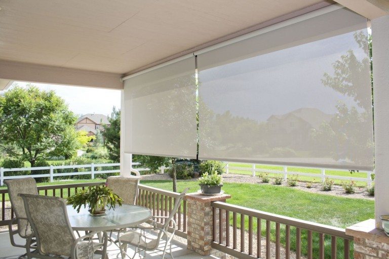 Insolroll Oasis exposed roller custom-sized patio sun shade with white fabric