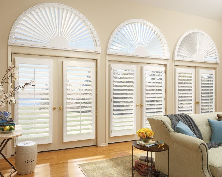 Newstyle composite shutters living room arched windows