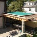 Pinnacle two pergola awning over a beautiful patio