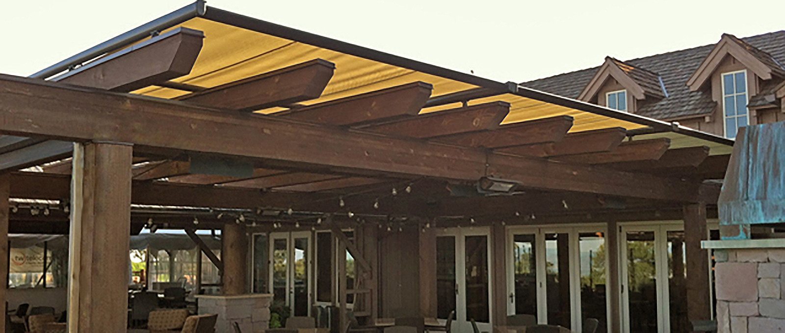 Pinnacle structure awning over pergola