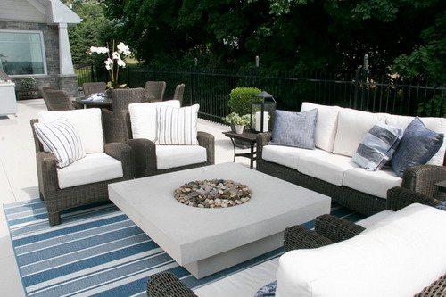 Elegant-and-Classic-Rattan-Chairs-with-White-Covers-and-Modern-table-in-Outdoor-Patio-Furniture-Designs