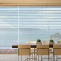 Silhouette sheer shadings dining with view