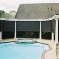Oasis 2800 patio shades on pool side patio exterior POV
