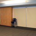 College dorm common area Insolroll blackout shades down