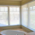 Pirouette shades bath corner by Innovative Openings