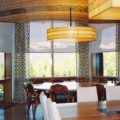 Insolroll solar shades dining room with mountain view
