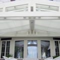 closeup of white Pinnacle structure awning on patio cover
