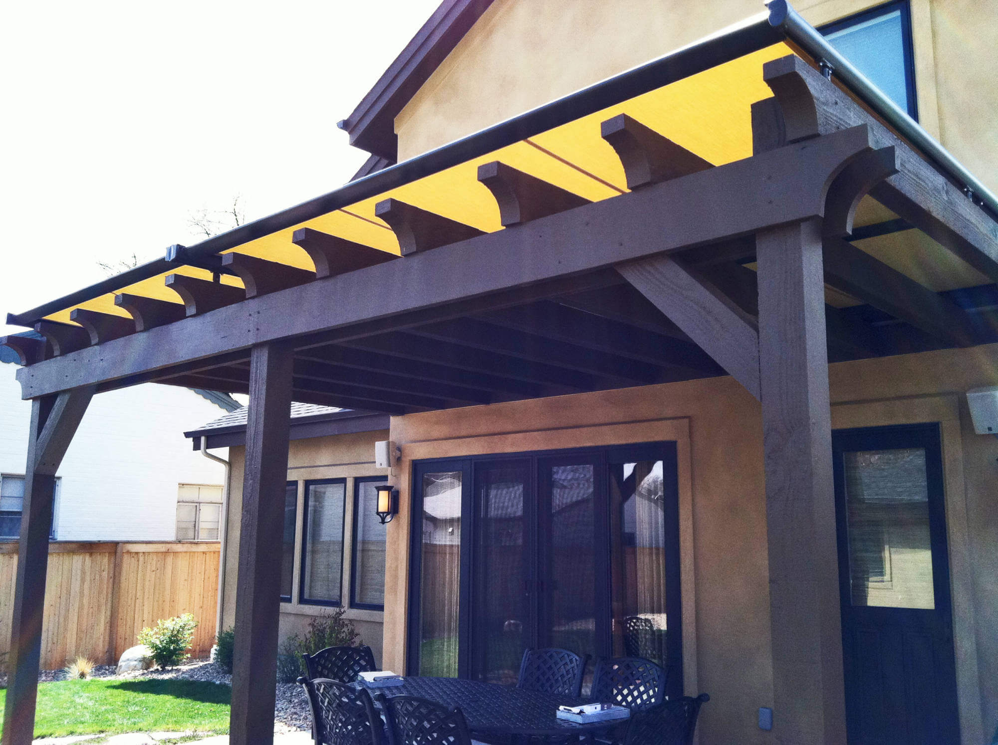 Oasis 2800 Patio Sun Shade on patio with swing