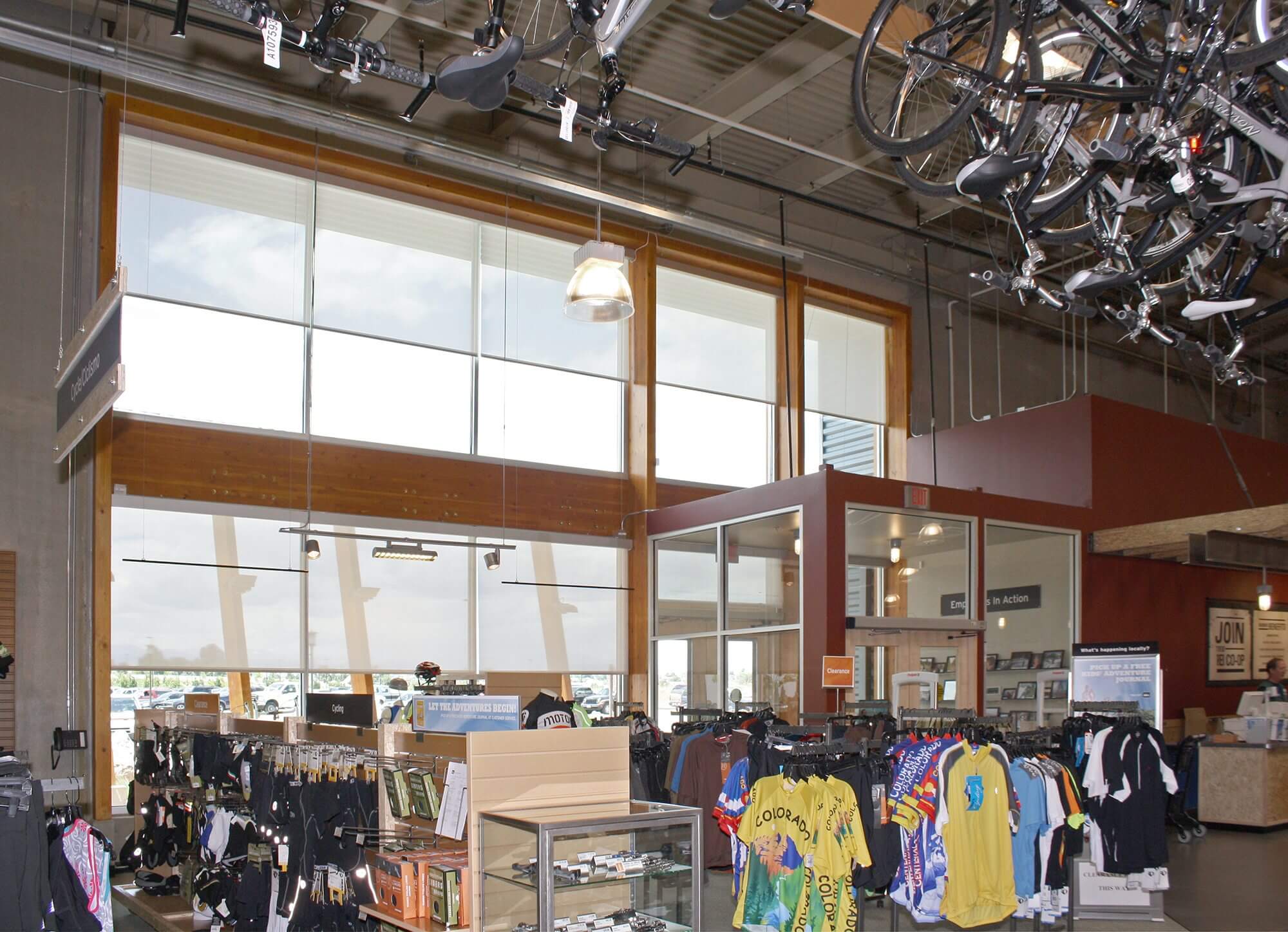 REI retail store Insolroll interior solar shades protect merchandise from sun and UV damage