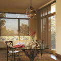 Skyline gliding window panels dining room matching roller shades