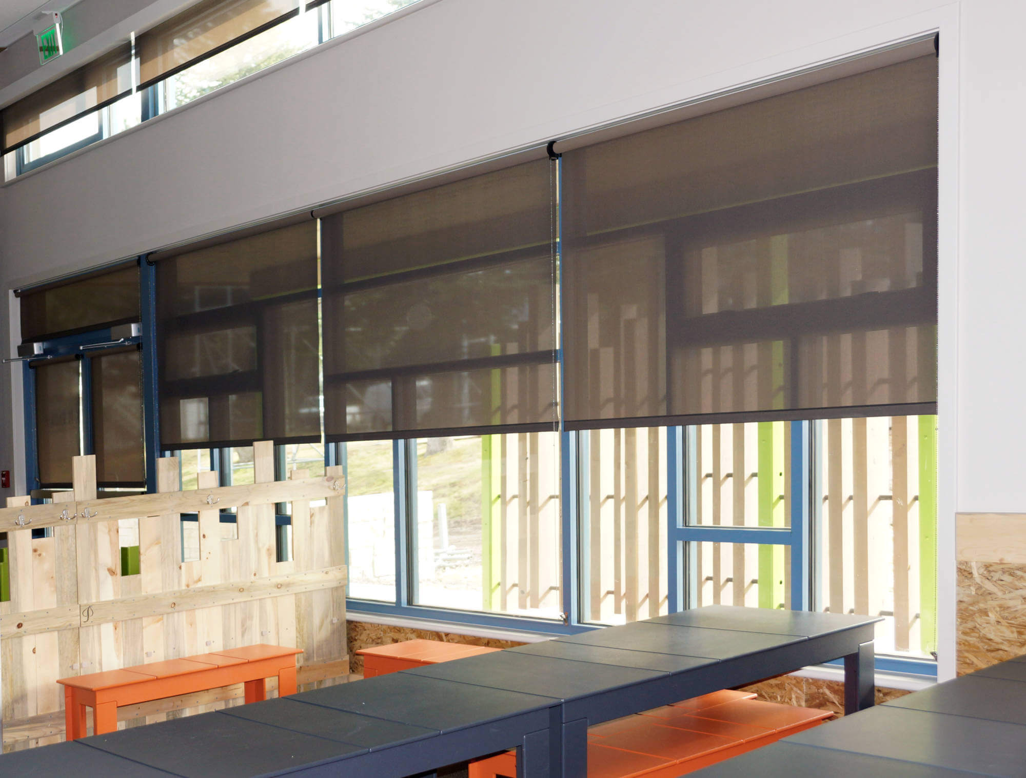 Insolroll commercial solar shades in downtown denver restaurant glare control