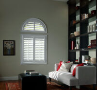 Arched window with shutters