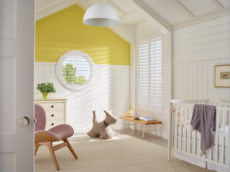 Round specialty shape window with Heritance Shutters