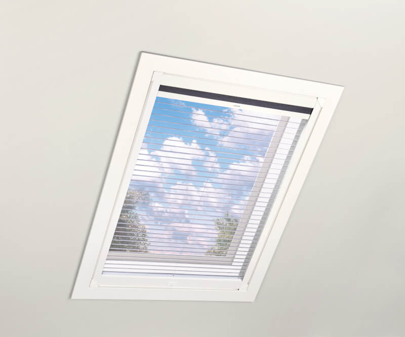 Skylight with Duette Duolite operable honeycomb shade clear shade shown