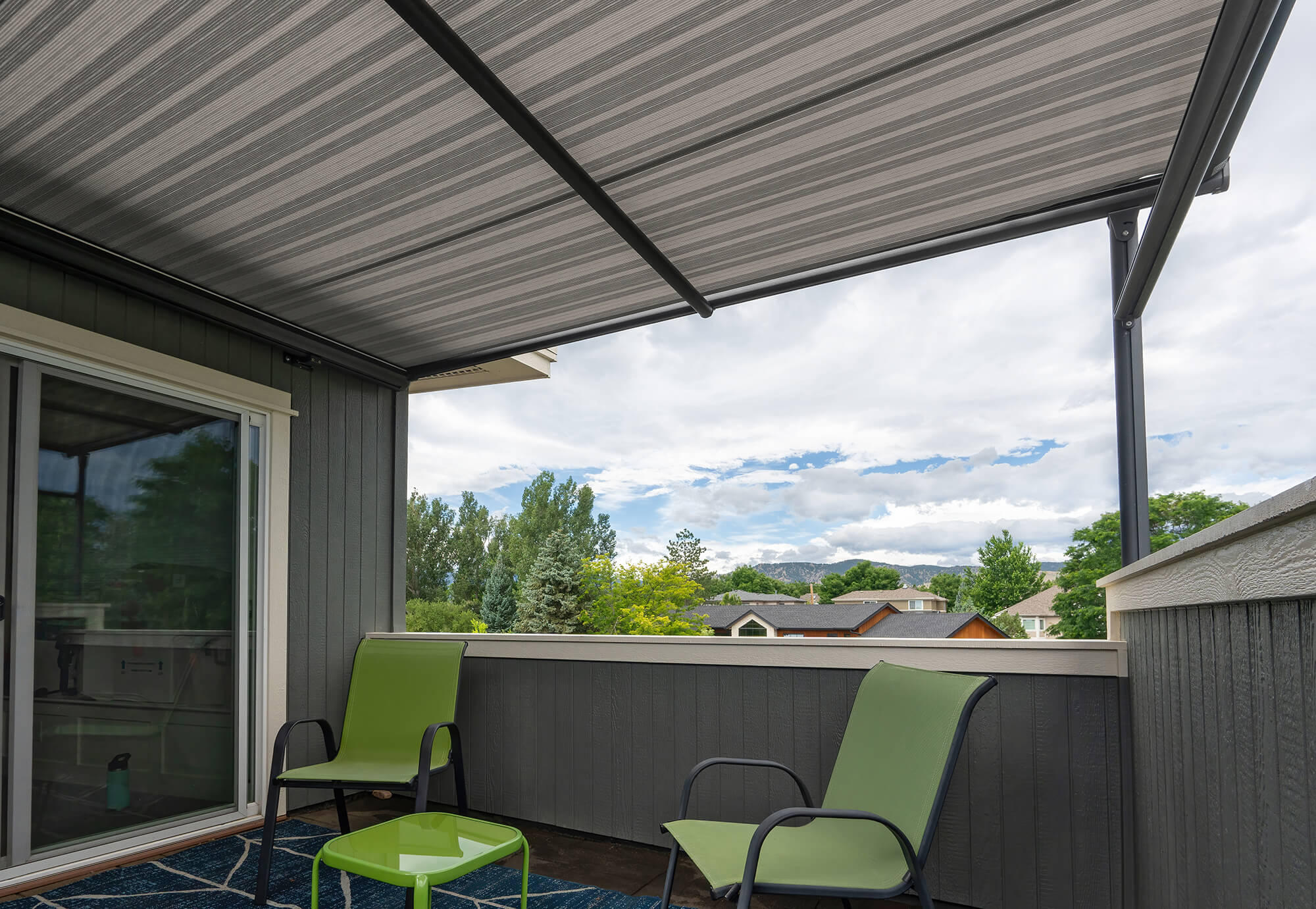 NoBo view from beneath a Pinnacle One Gray Striped Awning on Bedroom balcony