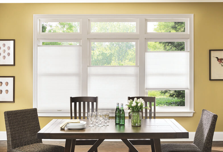 Alta honeycomb shades with Top-Down/Bottom-Up operation in dining room