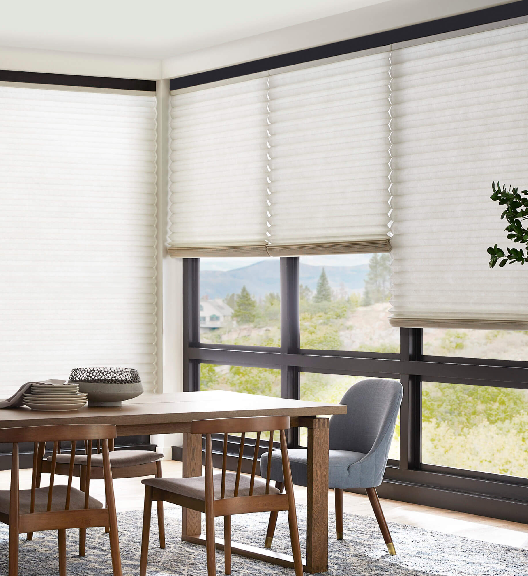 Alta softstyle honeycomb shades with hybrid pleats dining